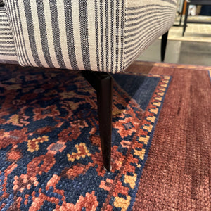 close up of black metal sofa legs
