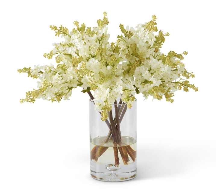 white lilac bouquet in glass vase