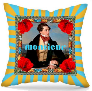 Decorative velvet throw pillow with text "Monsieur".