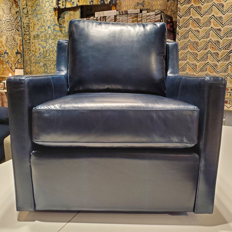 custom swivel chair done in top grain marine blue leather