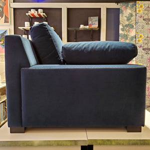 side view of custom sofa in blue velvet