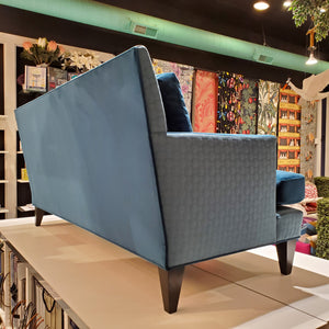 custom sofa in brilliant Peacock Teal velvet and quilted geometric pattern