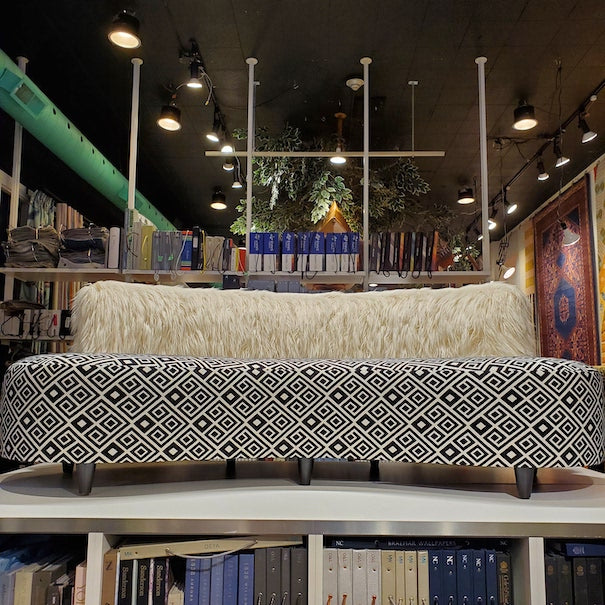 faux Mongolian fur sofa with striking geometrics