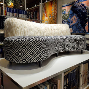 faux Mongolian fur sofa with striking geometrics