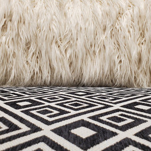 faux Mongolian fur sofa with striking geometrics