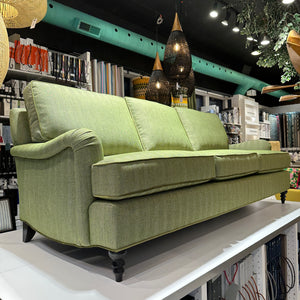 side view of green sofa