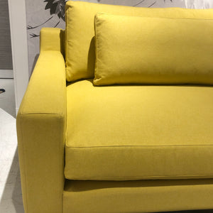 down filled yellow sofa