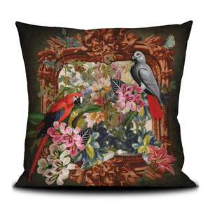 Velvet decorative throw pillow with flower and bird design.
