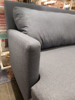 Grey upholstered sofa custom made in Canada.