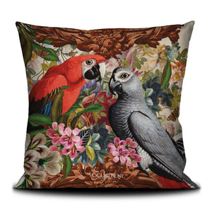 Velvet decorative throw pillow with flower and parrot design.