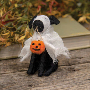 Felt ghost dog ornament, holding pumpkin trick or treat basket.