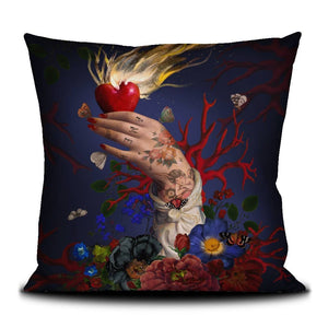 Decorative velvet throw pillow with flowers and bleeding heart.