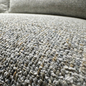 close up of grey stain resistant fabric sofa