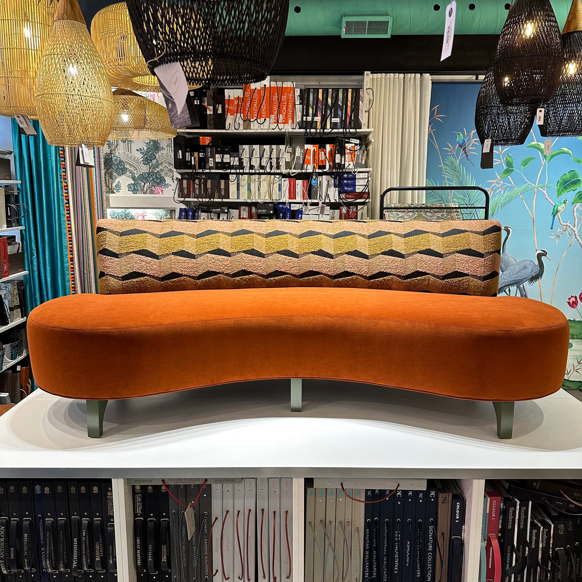 custom made orange velvet curved sofa