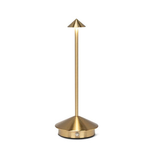 Unique arrow shade table lamp in gold.