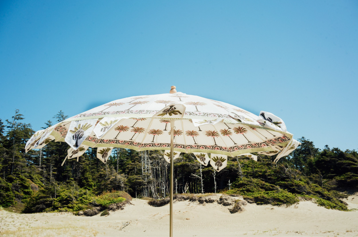 Hand block palm printed fabric parasol in pink.
