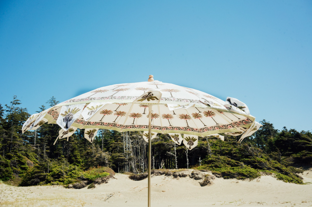 Hand block palm printed fabric parasol in pink.