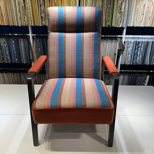 The Cambridge recliner in striped wool with corduroy piping in burnt orange.