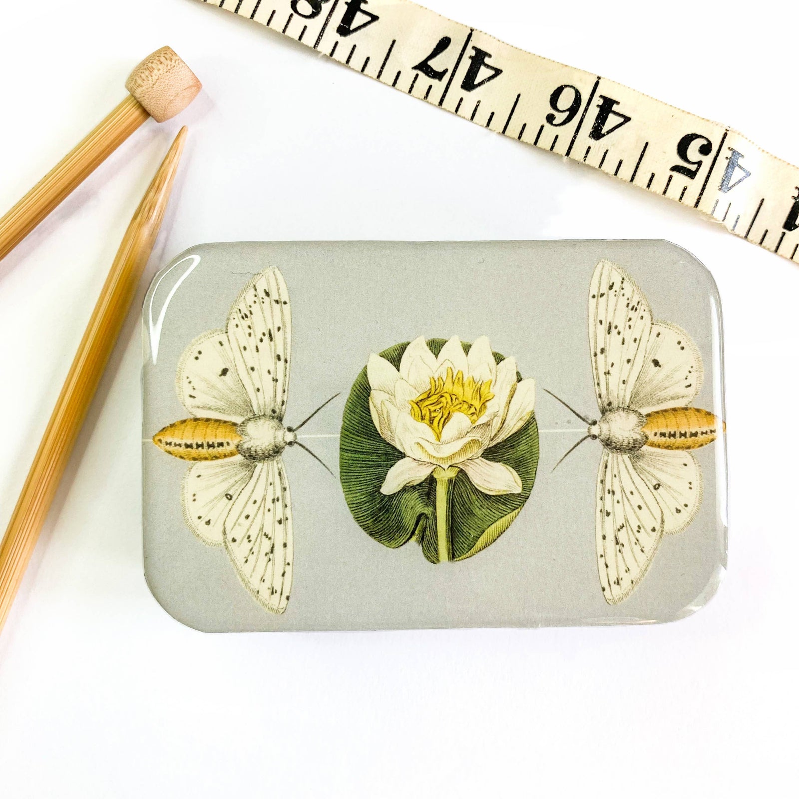 Moth and lotus flower stitch marker tin