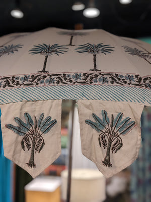 Hand block palm printed fabric parasol in blue.