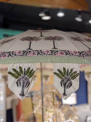 Hand block palm printed fabric parasol in pink.