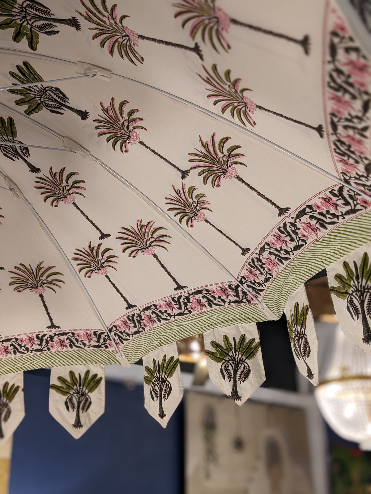 Hand block palm printed fabric parasol in pink.