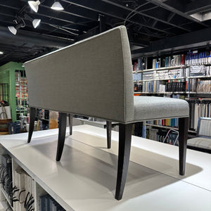 Back view of custom grey upholstered banquette. 