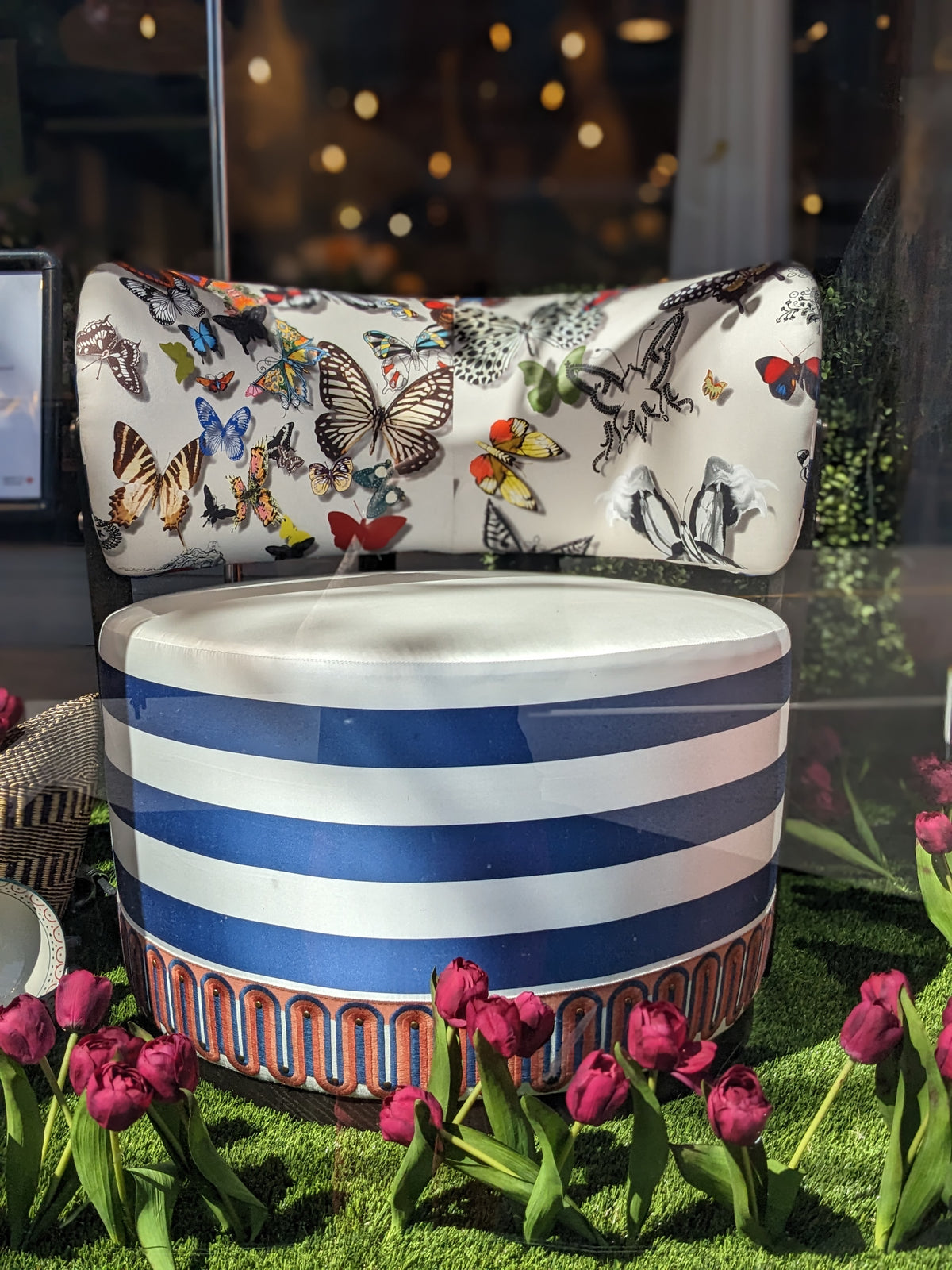 Custom swivel chair in stripes and butterflies.