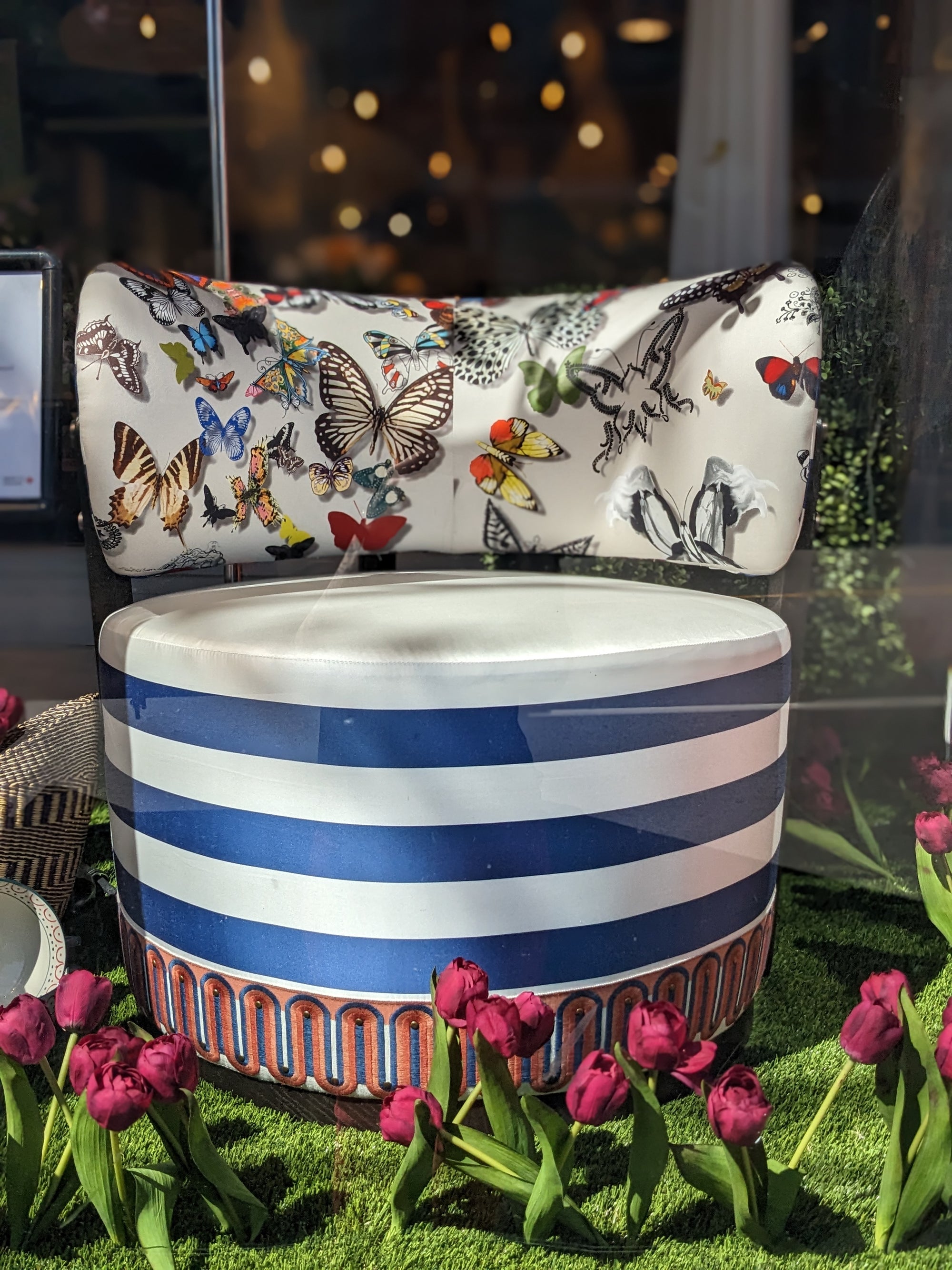 Custom swivel chair in stripes and butterflies.