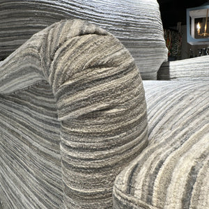 Close-up of Ingonish armchair pleated saddle arm.