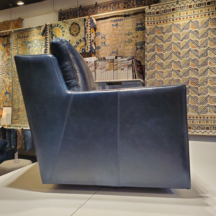 custom swivel chair done in top grain marine blue leather