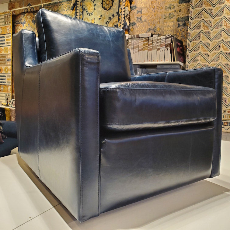 custom swivel chair done in top grain marine blue leather