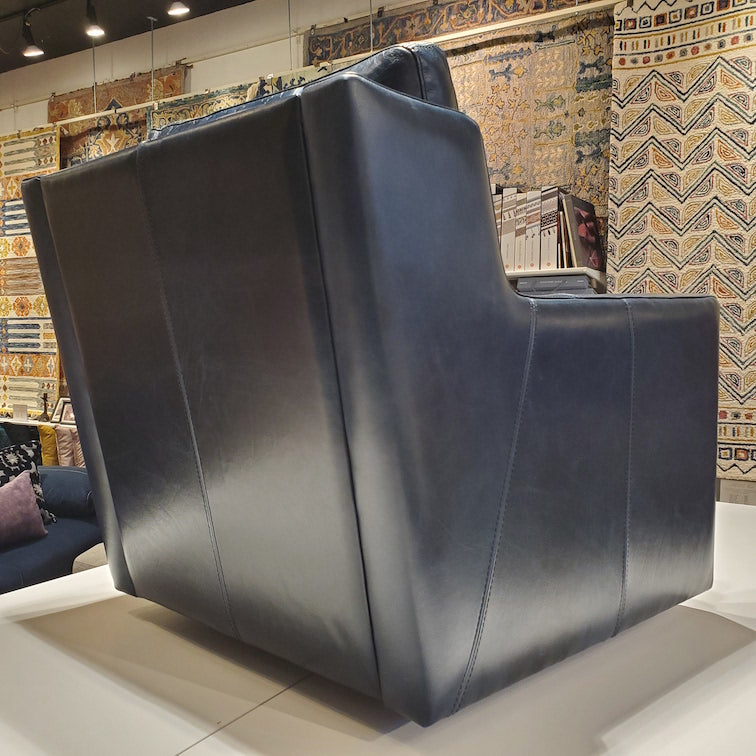 back view of custom swivel chair done in top grain blue leather