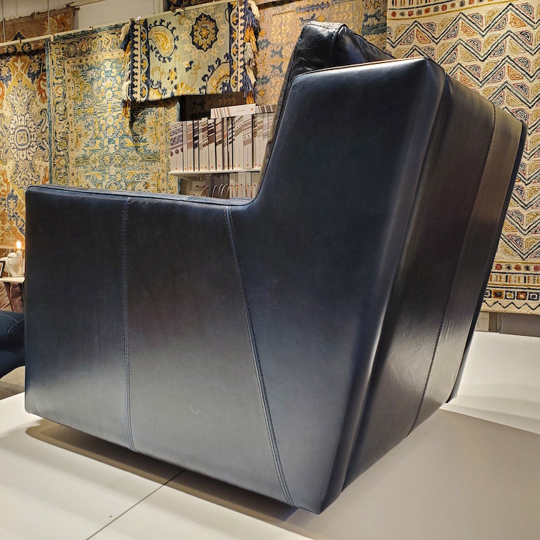 custom swivel chair done in top grain blue leather