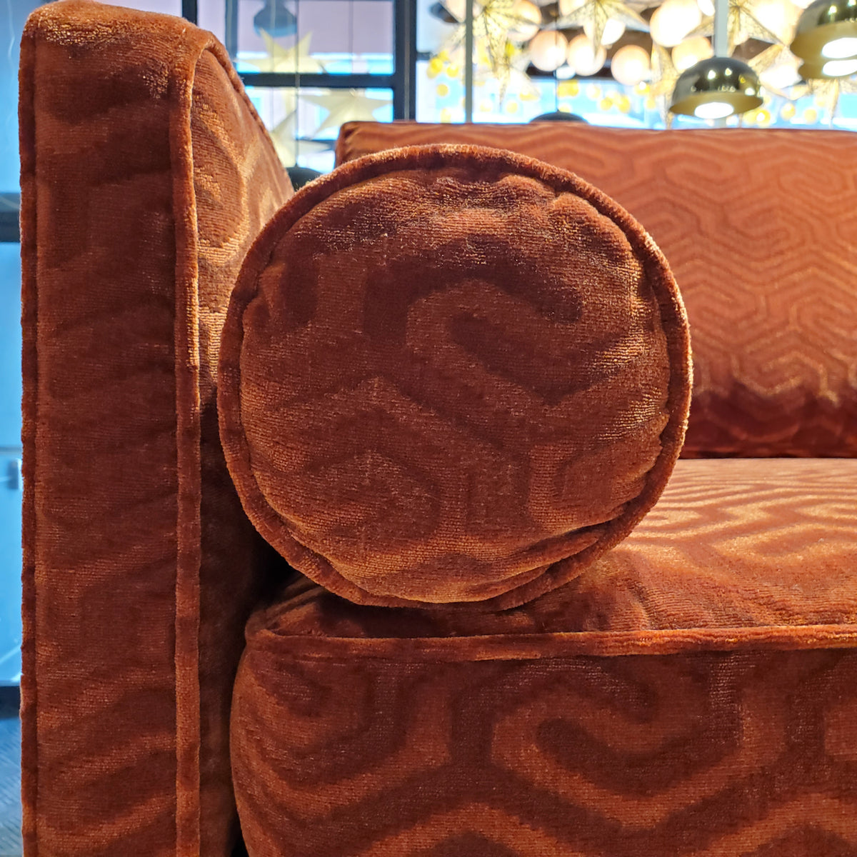 close up of custom sofa in modern graphic velvet done in Bordeaux Red