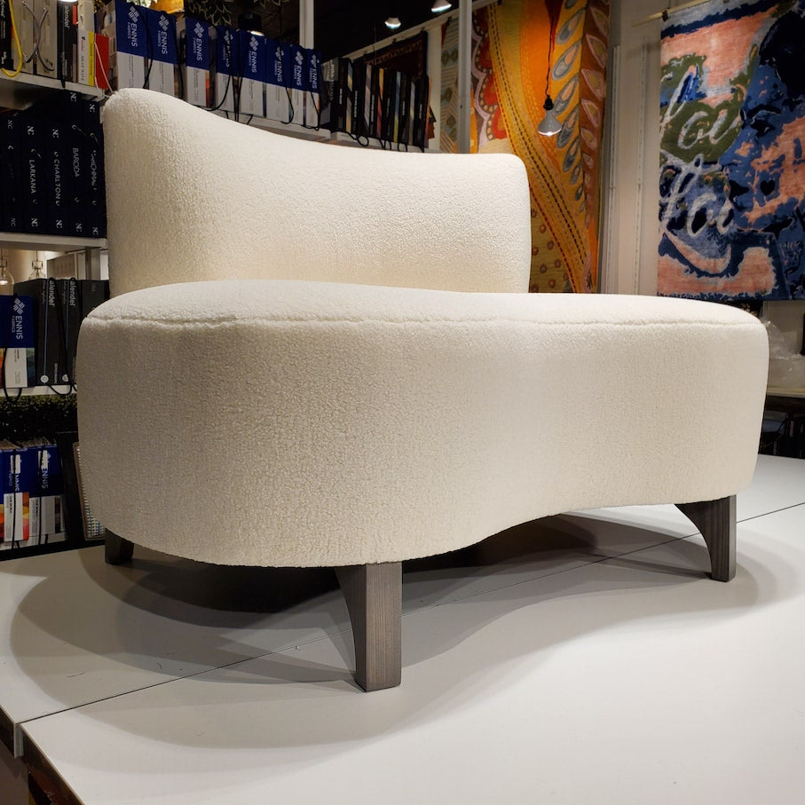 cream coloured curved sofa