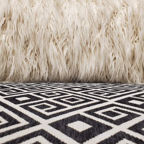 faux Mongolian fur sofa with striking geometrics