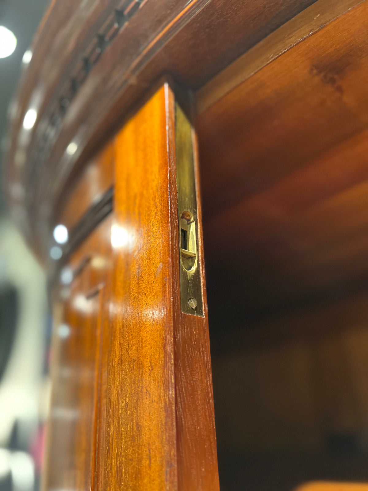 Edwardian mahogany demi-lune wardrobe