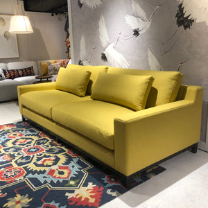 down filled yellow sofa